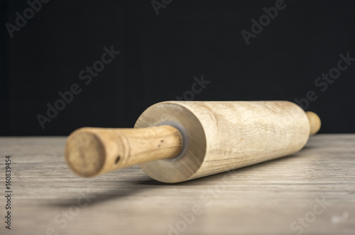 Close up shot of a rolling pin on table