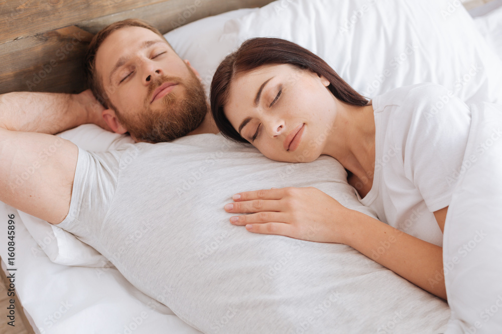 Brunette of heavenly beauty sleeping on chest of her man Brunette of heavenly beauty sleeping on chest of her man