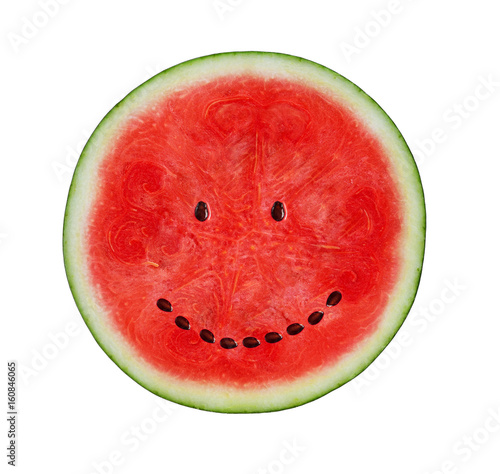 Watermelon with smile face. Funny watermelon on wooden white background