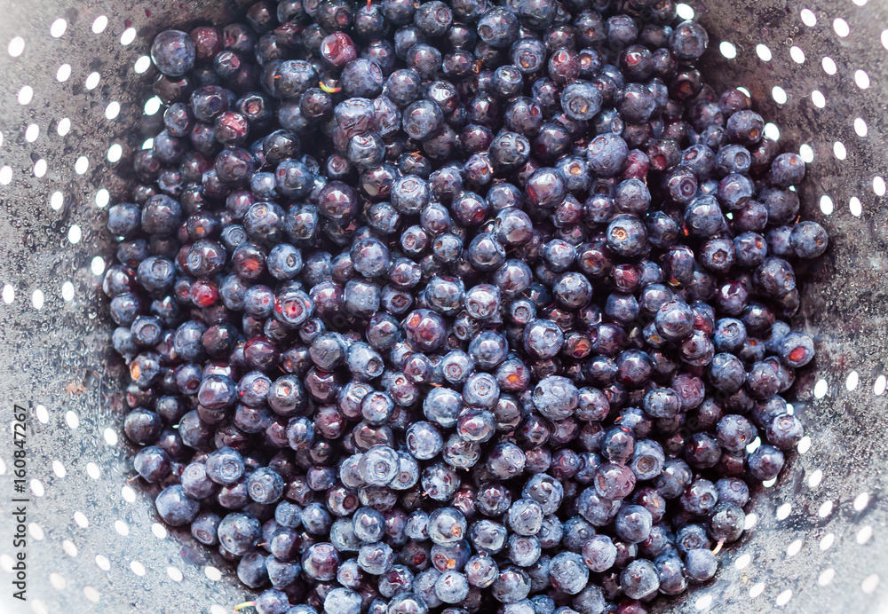 Tasty blueberries fruit in bowl. Blueberries top view. Tasty blueberries fruit in bowl. Blueberries top view.