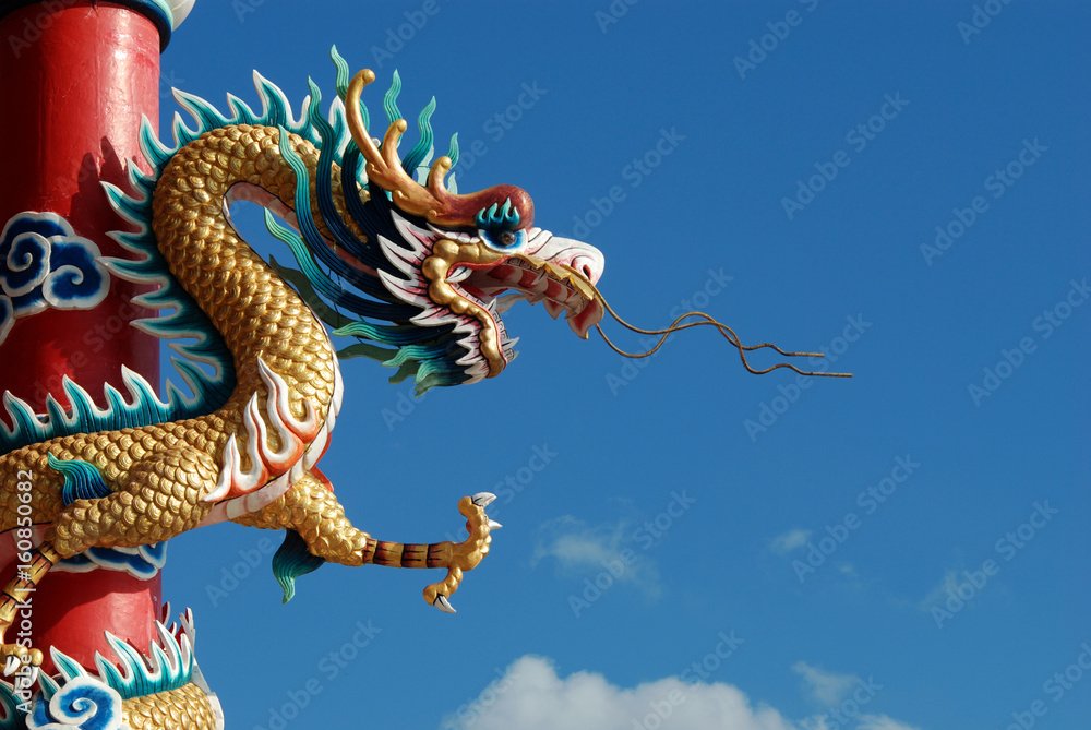 Chinese dragon in front of blue sky Chinese dragon in front of blue sky