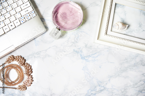 women's accessories on marble table