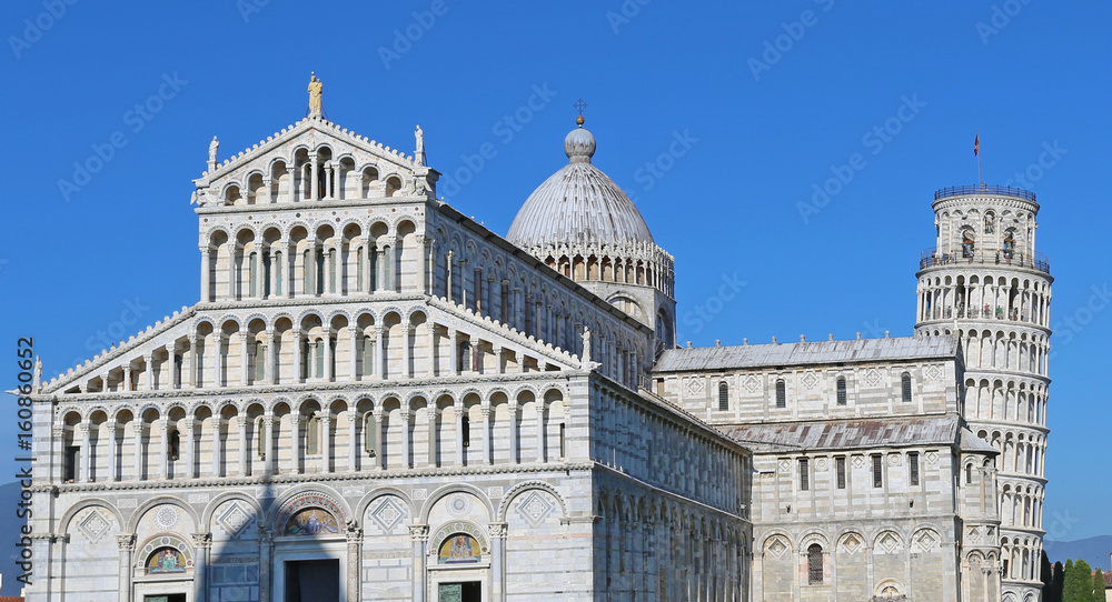 The Cathedral of Pisa Duomo di Pisa with the Leaning Tower of Pisa Torre di Pisa in Piazza dei Miracoli.