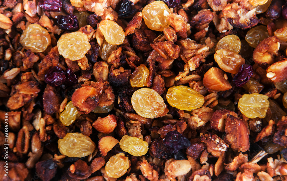 granola background made with mixed nuts granola background made with mixed nuts