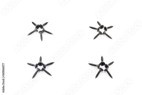 4 stars laid out with black screws on white background