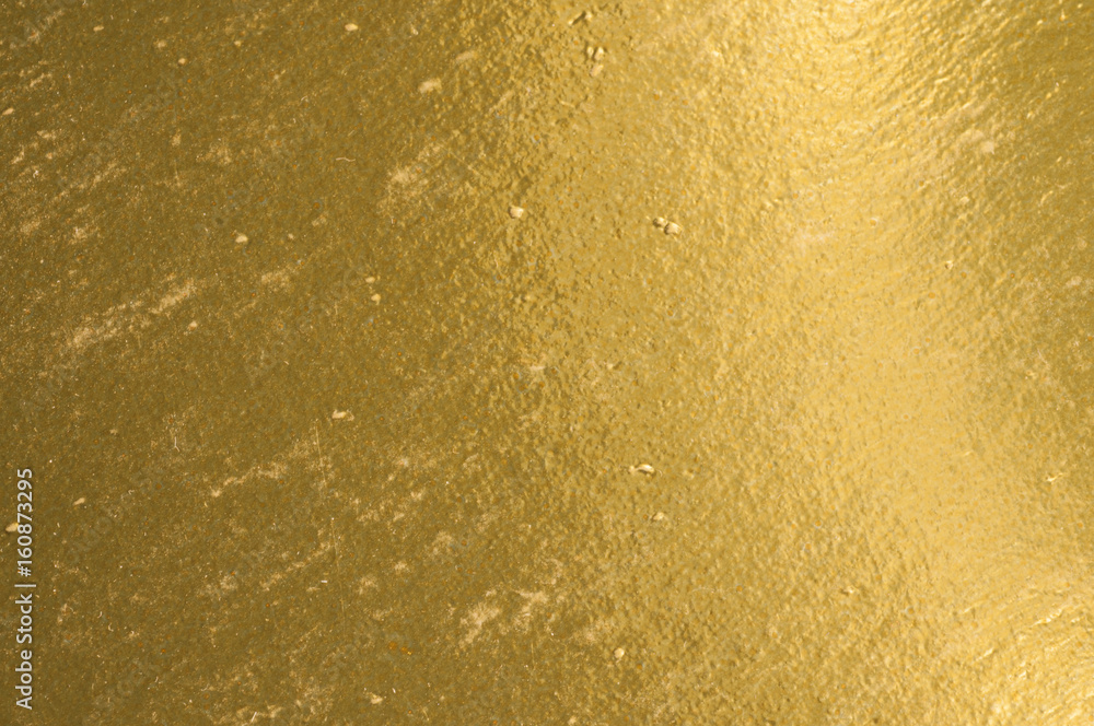 Obraz premium Abstract metallic gold background with stripes