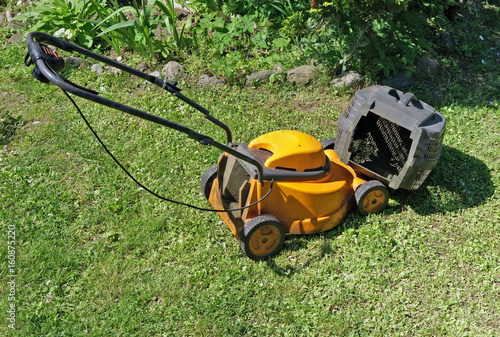 Last day of life of an old electric lawn-mower.