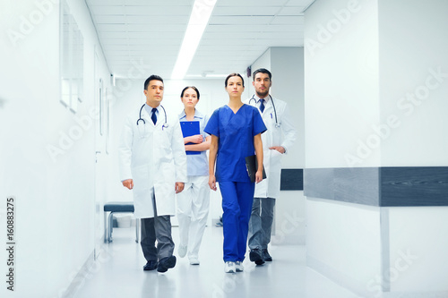 group of medics or doctors at hospital corridor