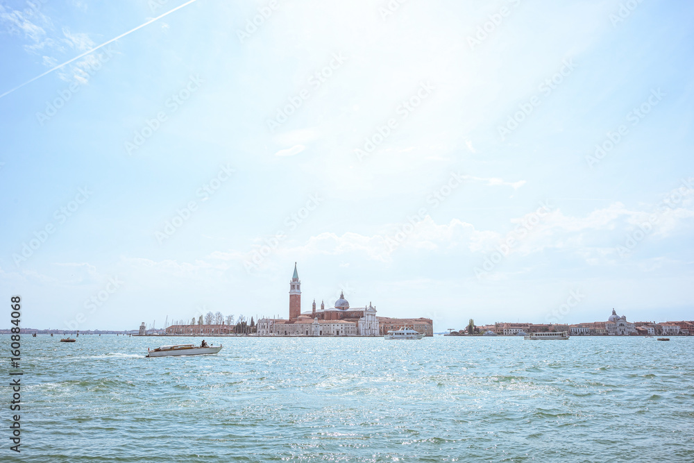 Naklejka premium San Giorgio island in Venice, Piazza San Marco. View from Grand Canal. Scenic cityscape with gondolas