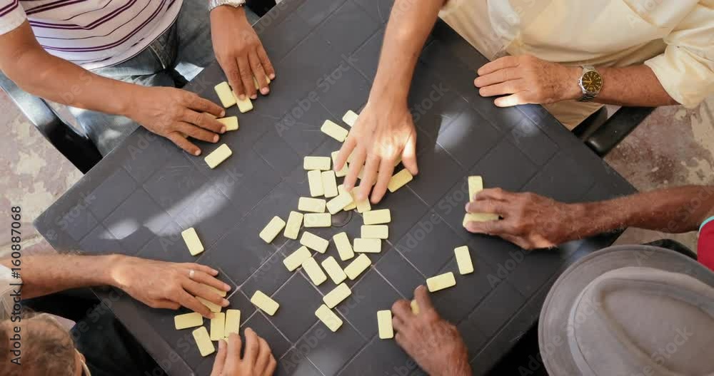 High Angle View Of Friends Men People Playing Domino High Angle View Of Friends Men People Playing Domino