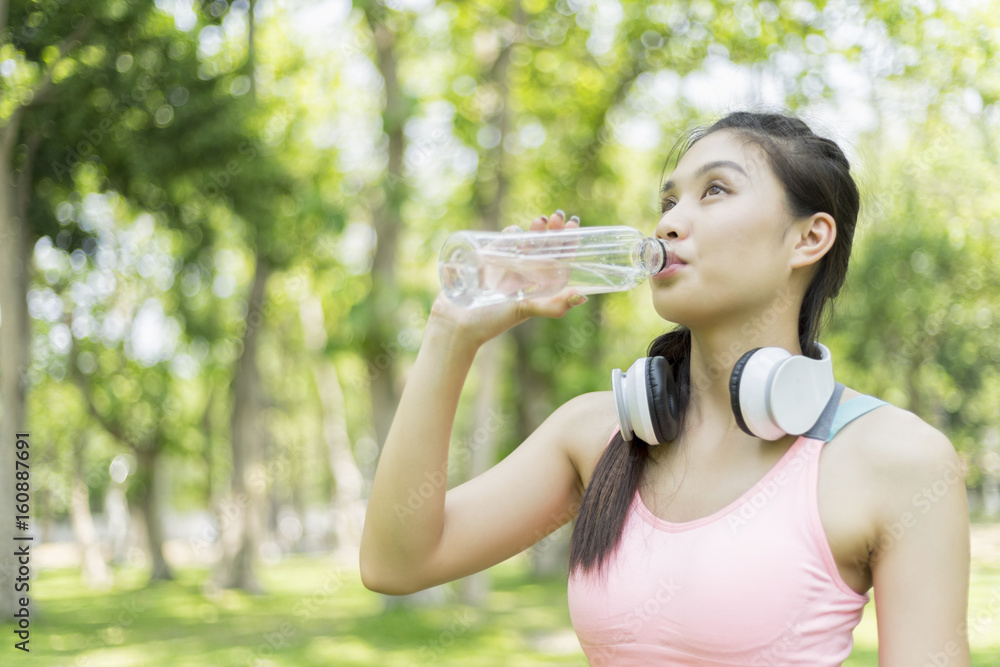 beautiful sport girl drinking water after jogging , sport concept beautiful sport girl drinking water after jogging , sport concept