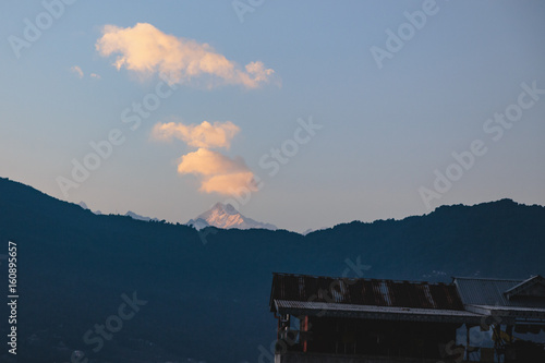 Kangchenjunga mountain with clouds above that view in the evening in Sikkim, India