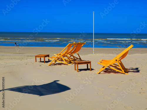 ORANGE DECKCHAIRS ON THE BEACH OF THE TOUQUET , PAS DE CALAIS, HAUTS DE FRANCE , FRANCE 