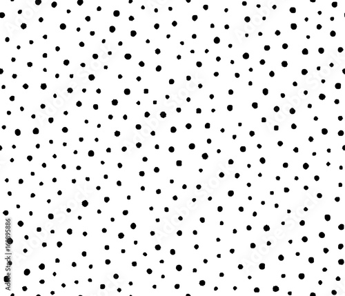 Vector illustration of seamless black dot pattern