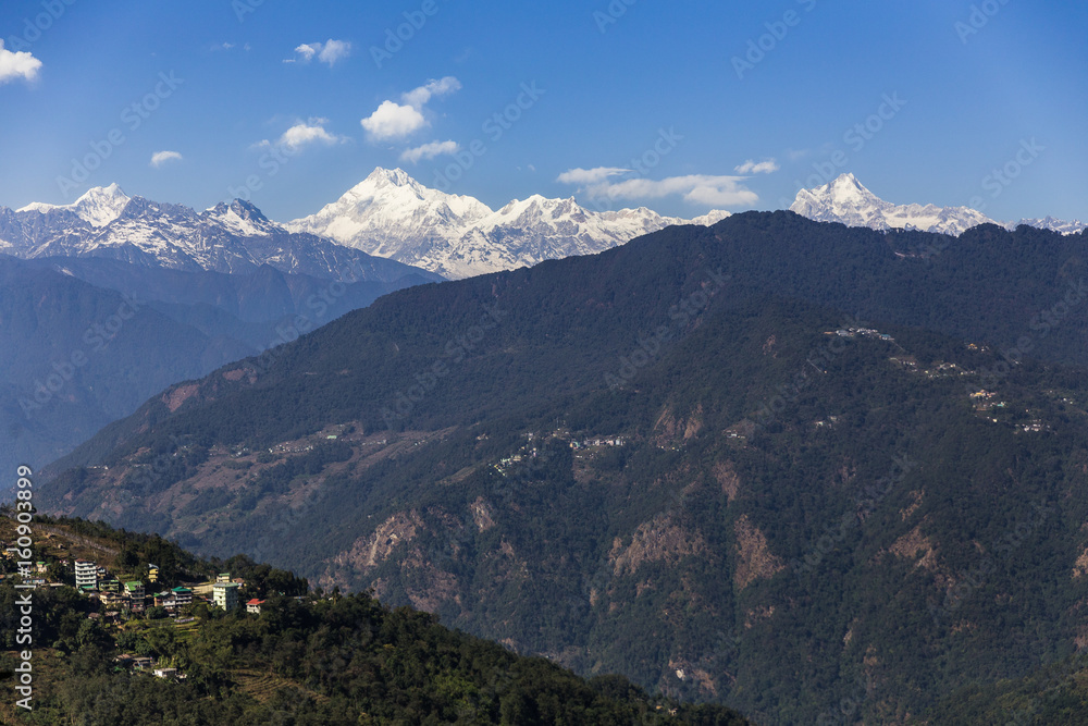 Kangchenjunga mountain with clouds above and mountain's villages that view in the morning in Sikkim, India