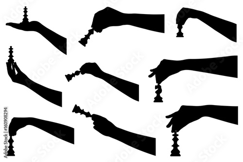 Set of hands holding chess pieces isolated on white
