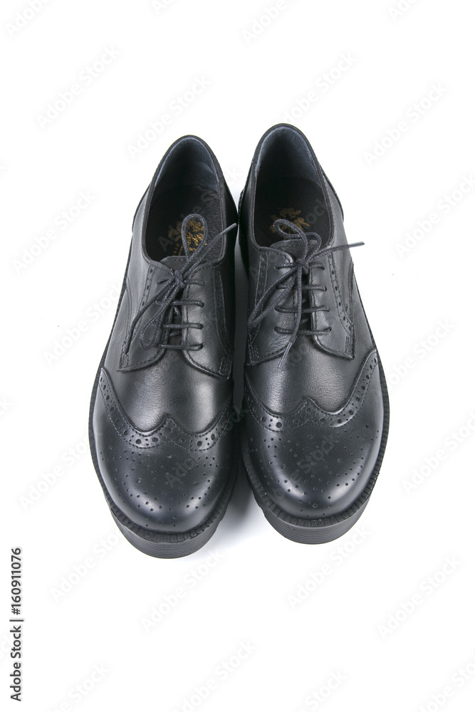 Black Shoe on White Background, Isolated Product, Top View, Studio. Black Shoe on White Background, Isolated Product, Top View, Studio.