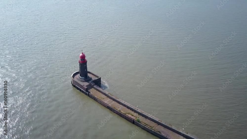 Aerial of a lighthouse from very high altitude Aerial of a lighthouse from very high altitude