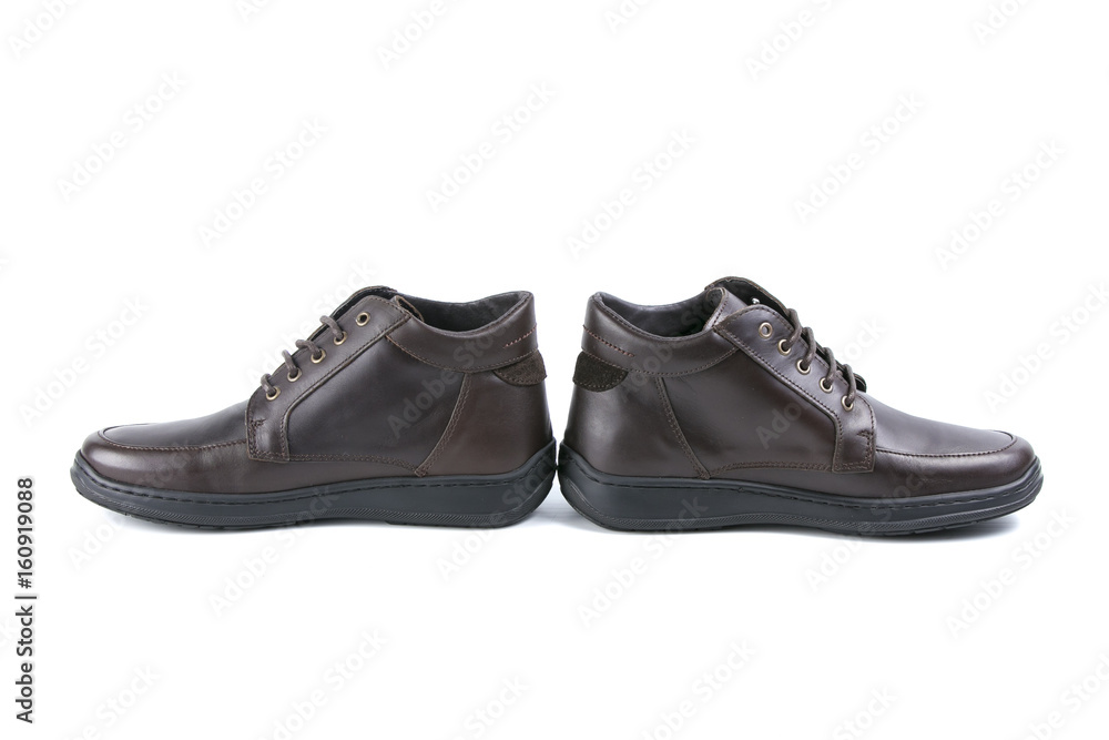 Brown Boot on White Background, Isolated Product, Top View, Studio. Brown Boot on White Background, Isolated Product, Top View, Studio.