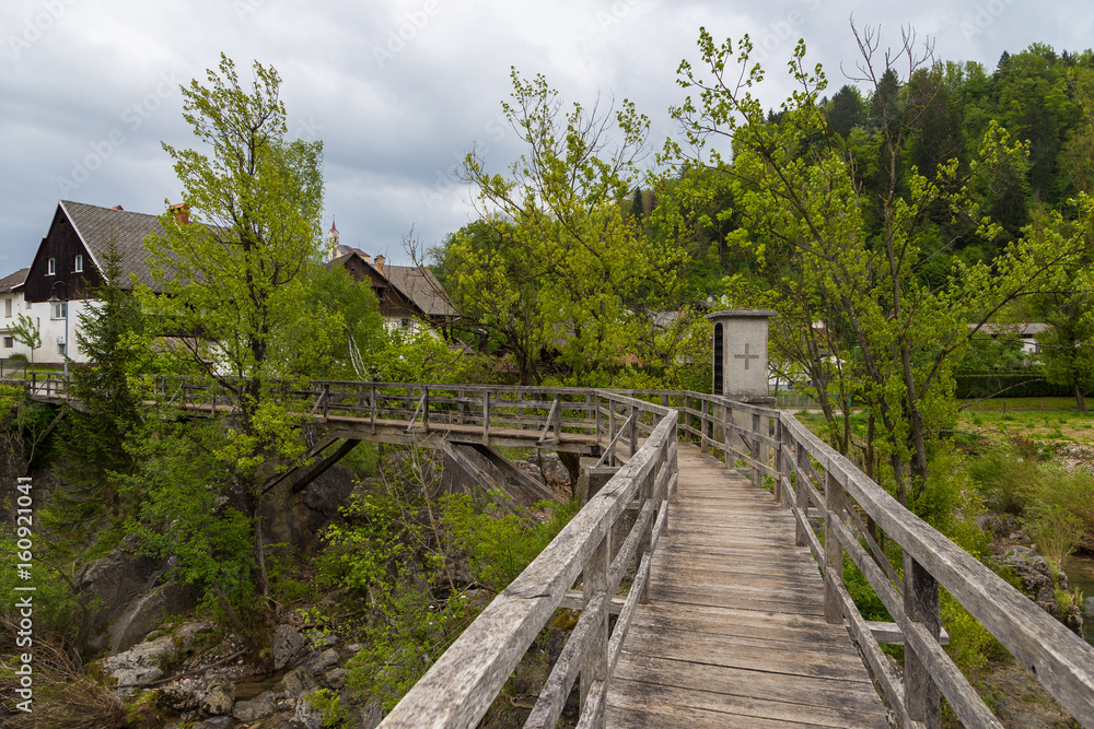 The Devil's Bridge, wooden footbridge in Skofja Loka, Slovenia The Devil's Bridge, wooden footbridge in Skofja Loka, Slovenia