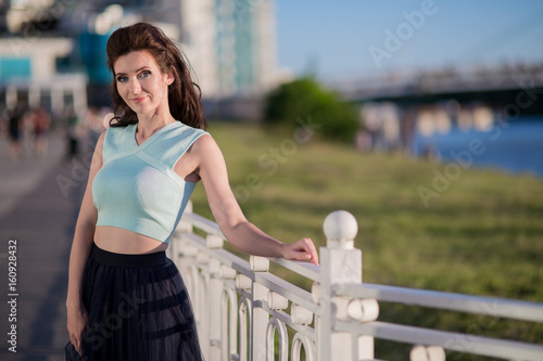 young woman on the river bank © Evgenia Tiplyashina