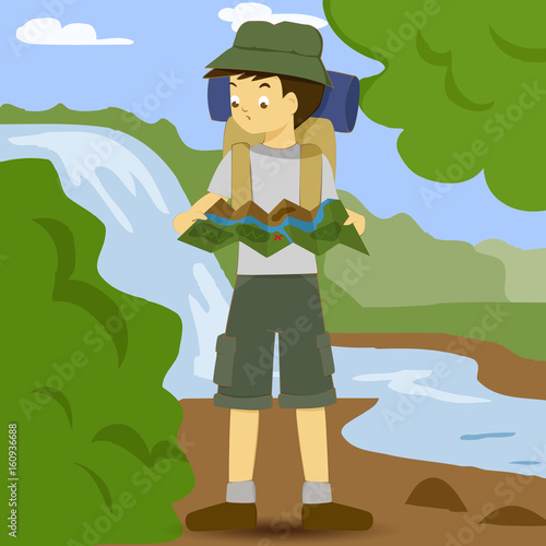 Asian boy with backpack studying map