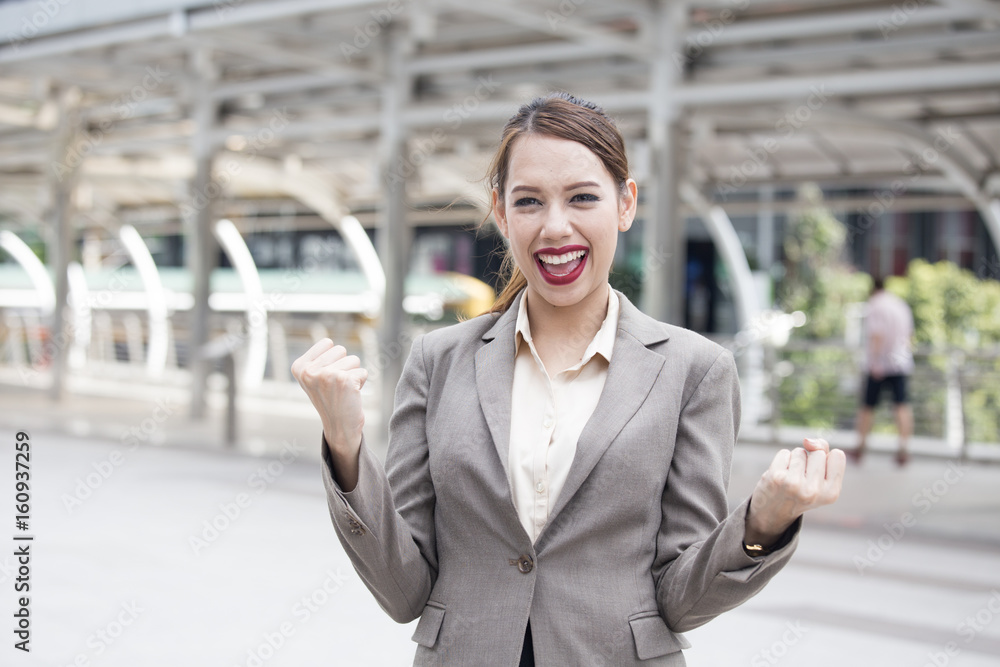 Beautiful woman feeling success for project at outdoor place, woman with happiness emotion concept. Beautiful woman feeling success for project at outdoor place, woman with happiness emotion concept.