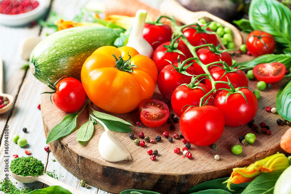 Fresh farm vegetables and herbs on rustic background. Fresh farm vegetables and herbs on rustic background.