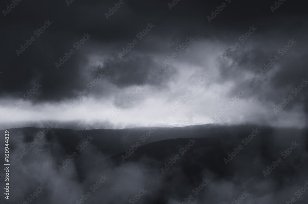 dark fantasy landscape with dramatic storm clouds at dusk dark fantasy landscape with dramatic storm clouds at dusk