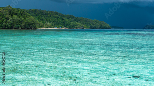 Beautiful Blue Lagoone shortly before Thunderstorm, Gam Island, West Papuan, Raja Ampat, Indonesia