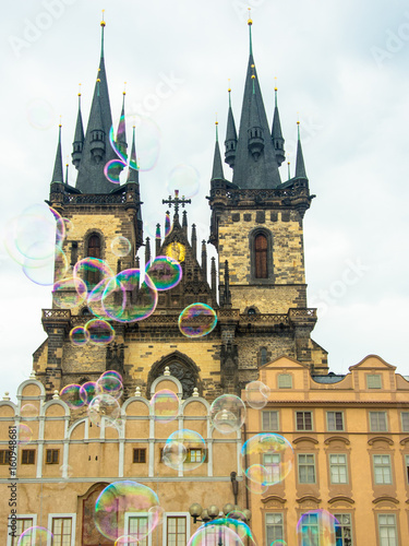 Photography church of our lady before tyn in prague viewed trough soap bubbles happy holiday