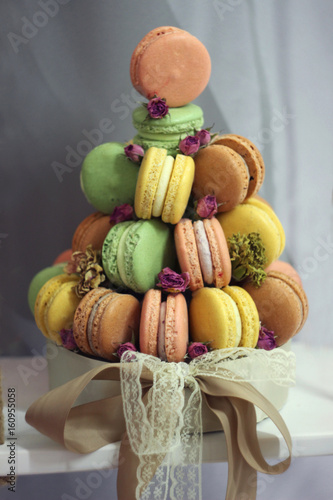 Macarons stacked in the form of a cake, delicious dessert