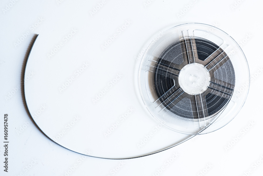 Naklejka premium Movie symbol, unrolled super 8 mm film