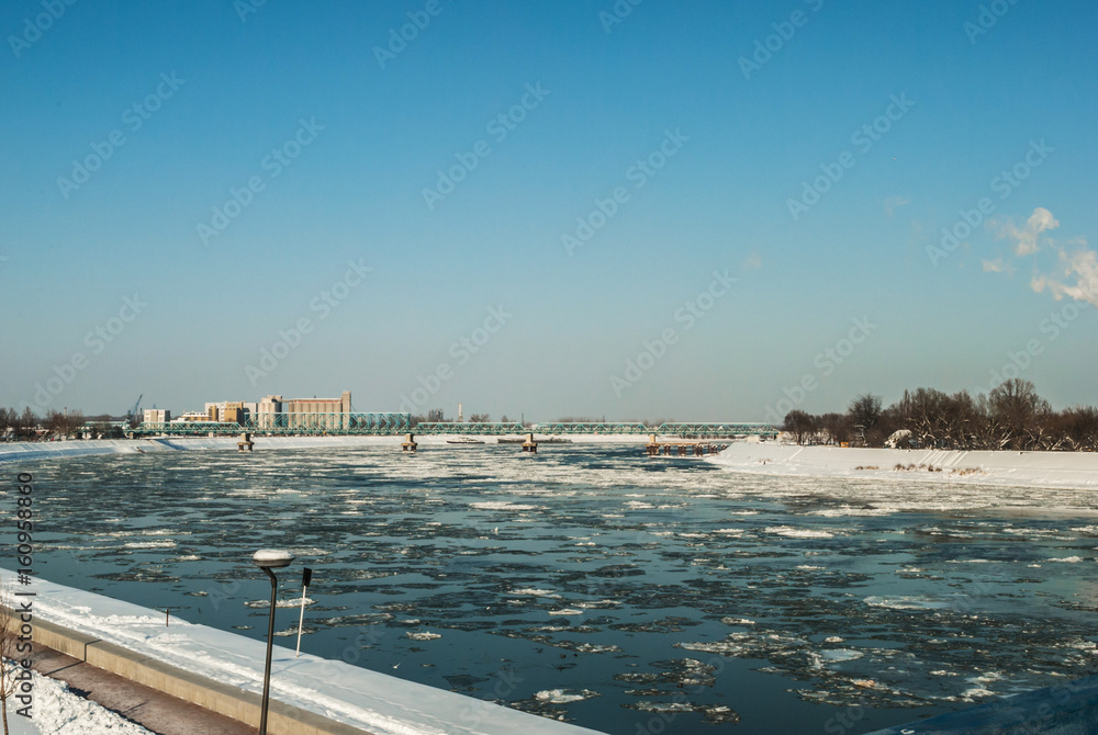 Frozen Danube river with boats that sail by this river Frozen Danube river with boats that sail by this river