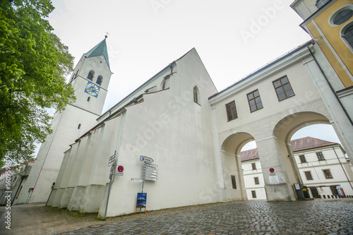 A low angle view of the Saint Mary and Corbinian Cathedral belfry in Freising  Germany.