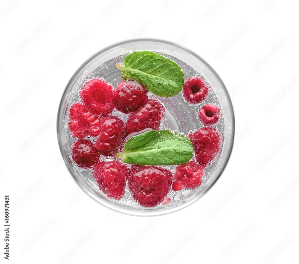 Tasty refreshing lemonade with berries in glass on white background Tasty refreshing lemonade with berries in glass on white background