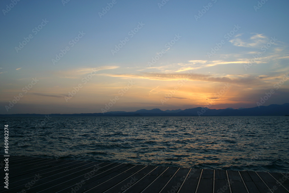 lake on the background of beautiful sunset sky