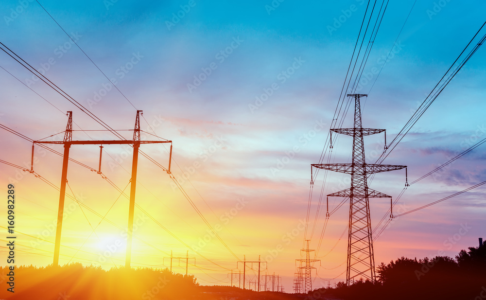 Fototapeta premium High Voltage Electric Transmission Tower Energy Pylon.