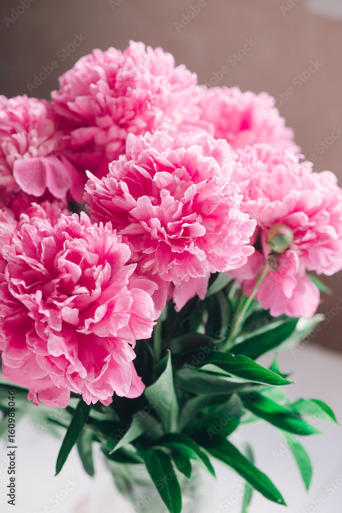 Beautiful bouquet of pink peonies.Pastel floral wallpaper, background from flower petals .