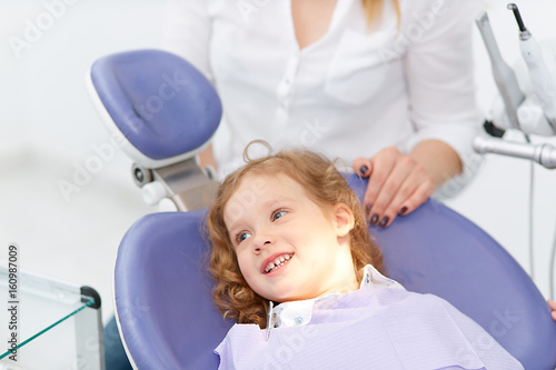 Little girl in dentist chair