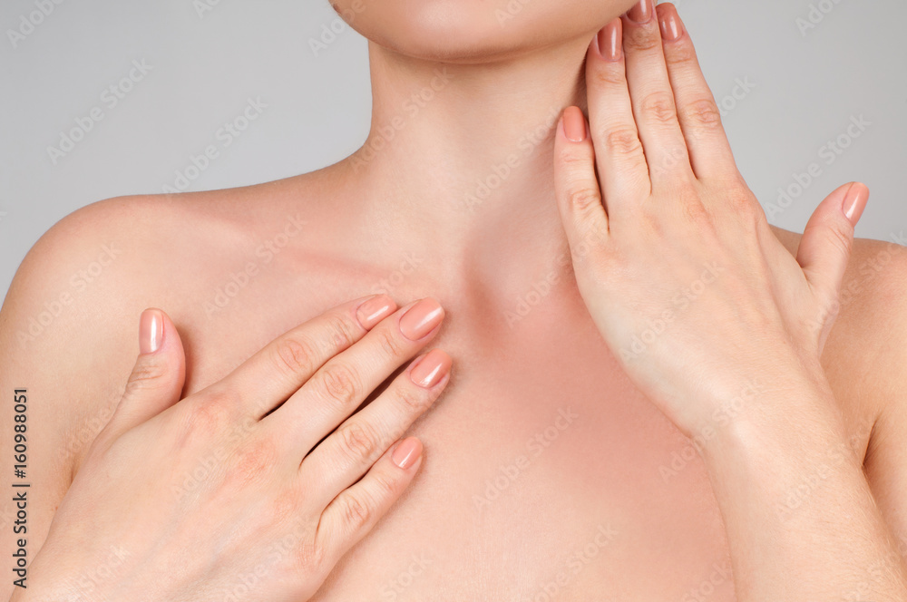 Fototapeta premium Beauty and Skincare concept. Beautiful woman touching her neck