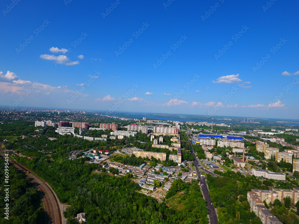 Obraz premium Aerial view. Houses, railway, road and traffic in the city Dnepr, Ukraine.