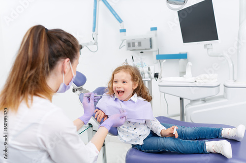 Little girl in dentist chair