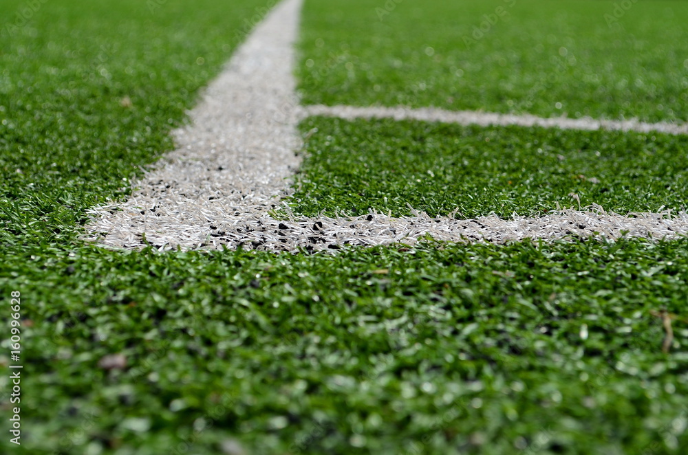 Fototapeta premium football field with artificial turf, angle, background