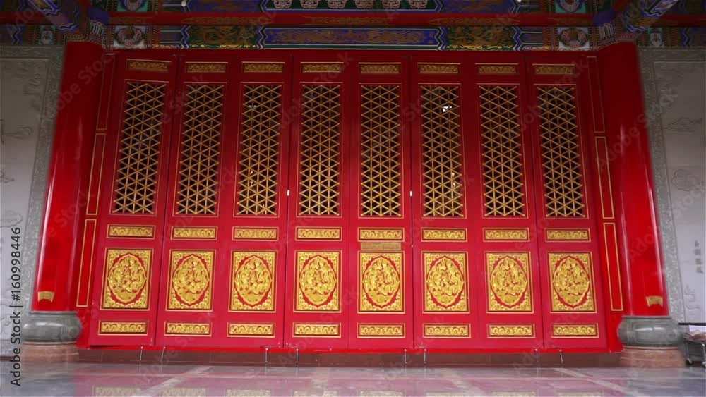 Chinese temple door in Thailand. (Panning shot) Chinese temple door in Thailand. (Panning shot)