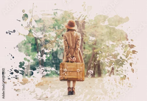 Obraz Rudzielec dziewczyna z walizką w jesień parku.