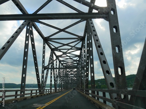 A close up of a covered steel bridge over Table Rock Lake, Missouri © raksyBH