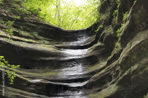 Dry waterfall in the forest.