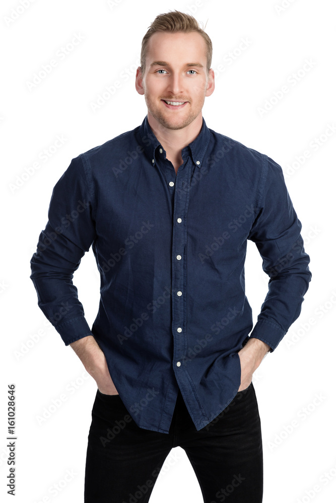 Handsome blonde man standing against a white background wearing a blue shirt and jeans. Handsome blonde man standing against a white background wearing a blue shirt and jeans.