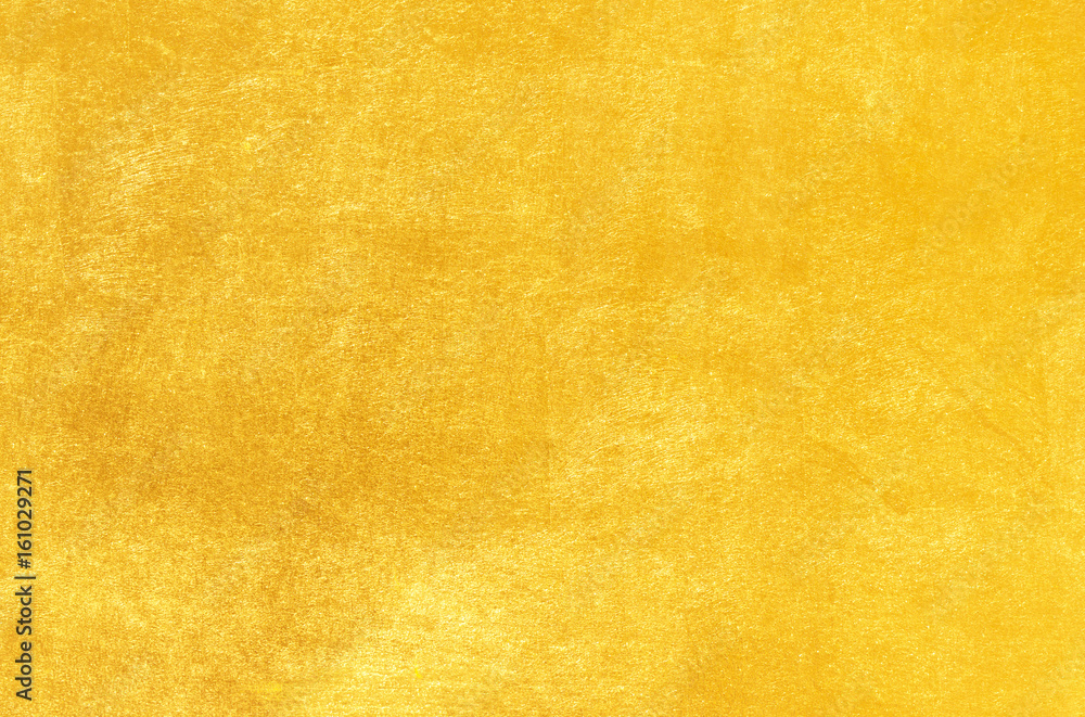 Obraz premium Shiny yellow leaf gold foil texture